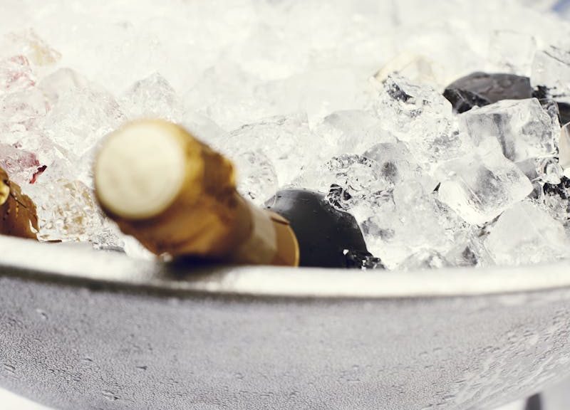 Wine Bottles in Stainless Steel Tray Filled With Ice