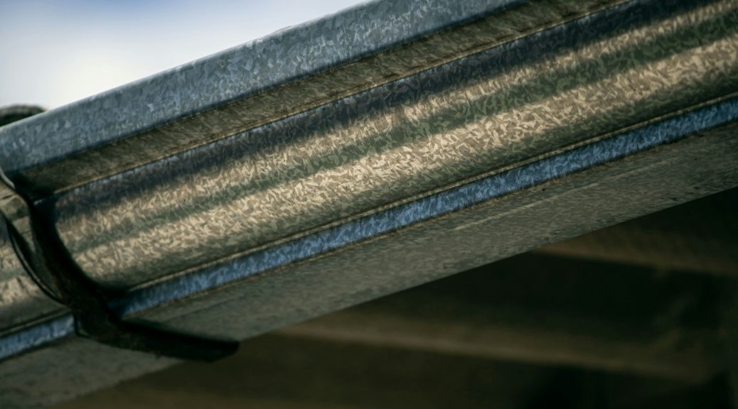 a close up view of a metal gutter